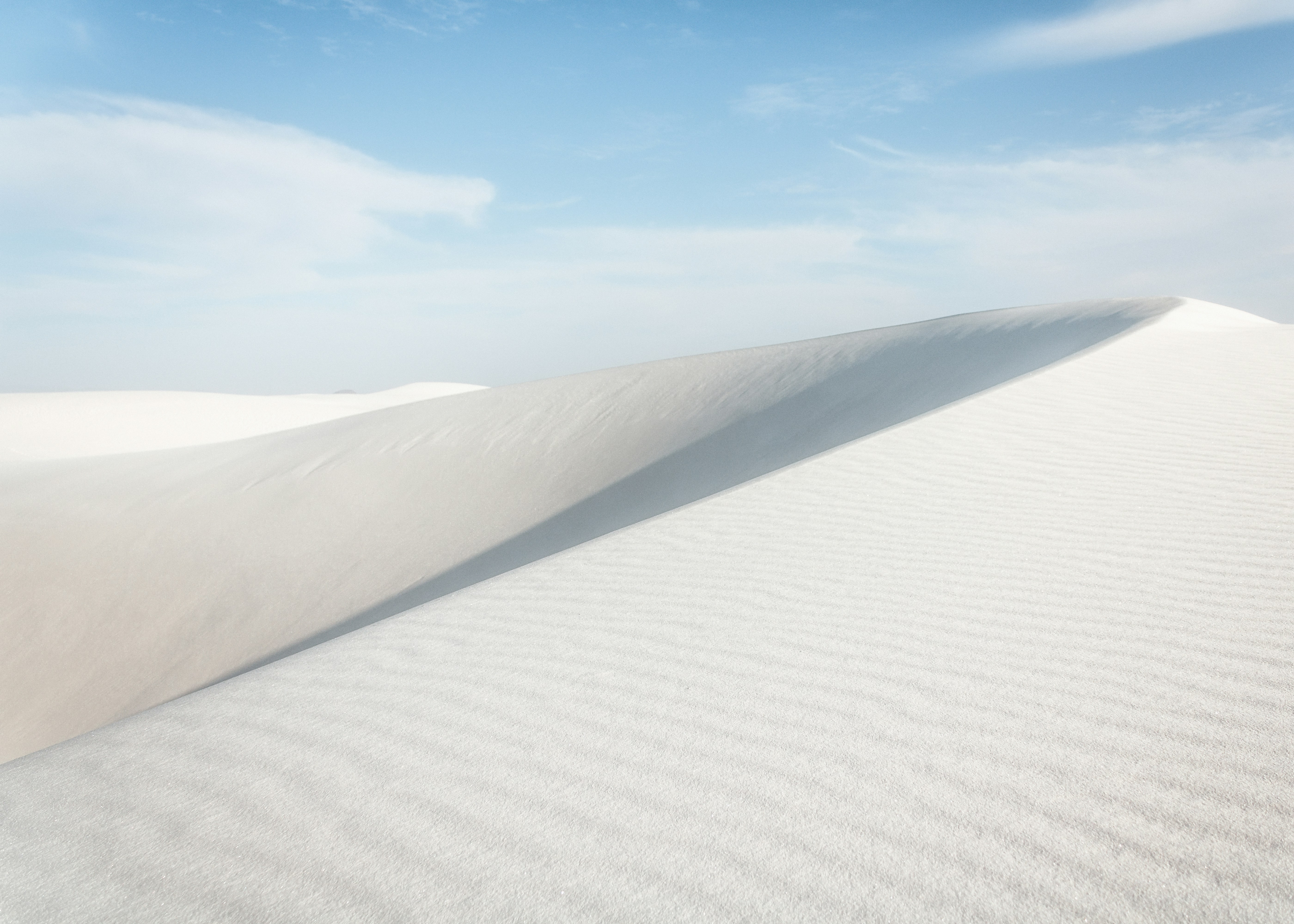 White sand dunes. Photo by David Whipple on Unsplash